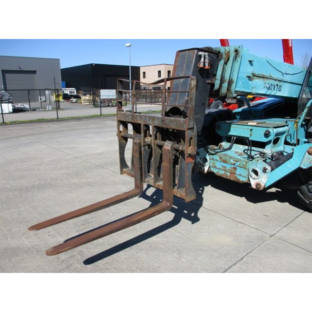 Chariot télescopique de marque JLG, modèle d’occasion, équipé d’un moteur diesel.