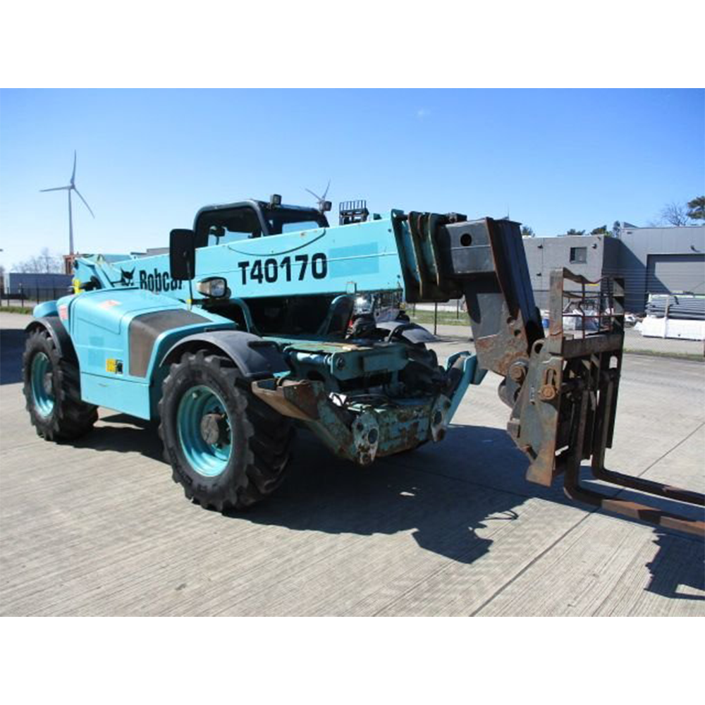 Chariot télescopique de marque JLG, modèle d’occasion, équipé d’un moteur diesel.