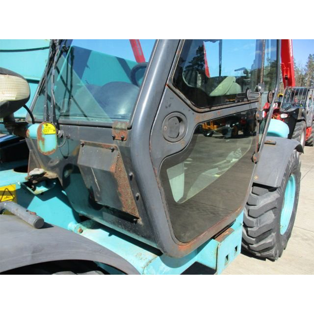Chariot télescopique de marque JLG, modèle d’occasion, équipé d’un moteur diesel.