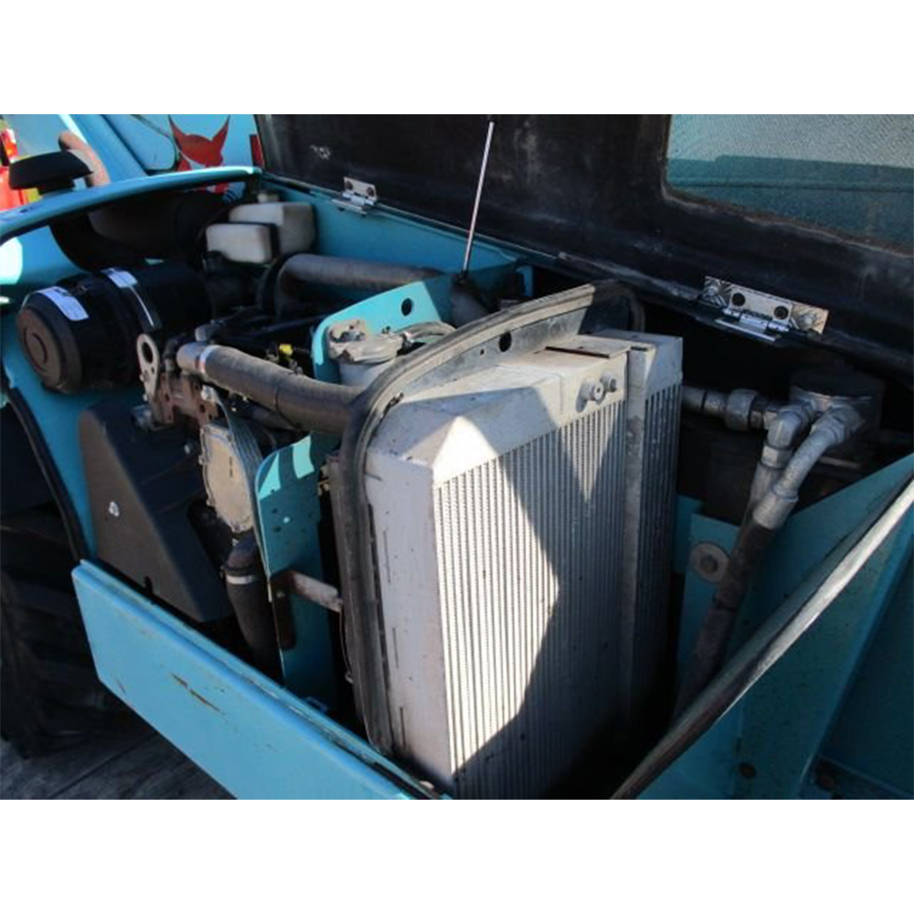 Chariot télescopique de marque JLG, modèle d’occasion, équipé d’un moteur diesel.
